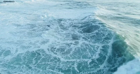Large ocean wave forming and crashing in the open sea The Concept of enviro.. Stock Footage 336269567