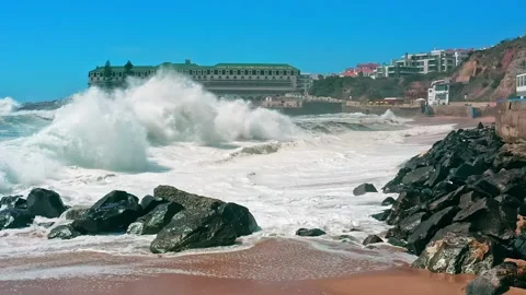 Large ocean waves crash about stones - slow motion. Stock Footage 204981681