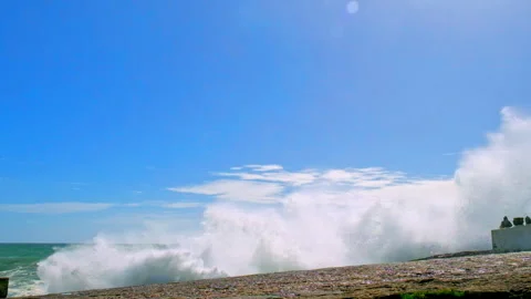 Large ocean waves crash about the  pier. Slow motion - ocean waves splashes.. Stock Footage 265579243