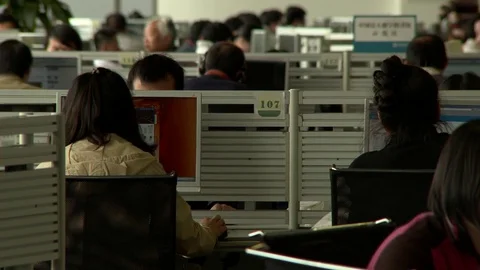 Large office or research area with people working at computer stations Stock Footage 77338352