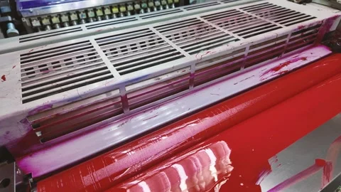 Large offset printing press machine. Close up roll colour Red. Production line Stock Footage 309640928