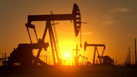 Large Oil Field At Sunrise Stock Footage