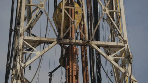 Large oil pump machinery at work in Louisiana Stock Footage 125698253