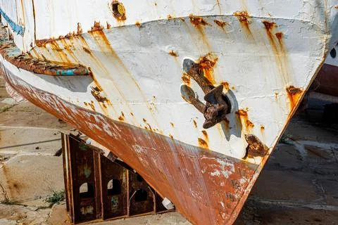 Large old iron rusting ship in dry dock Stock Photos