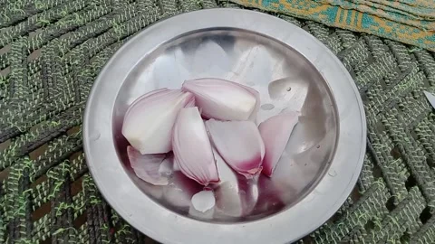 Large Onion Slices Being Cut by Hand in Daylight 스톡 동영상 347182783