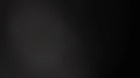 Large opaque light moves in the black background Vidéo 309426031