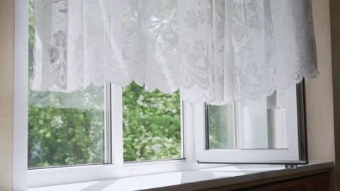 Large open plastic window with thin transparent curtain Stock Footage 146752450