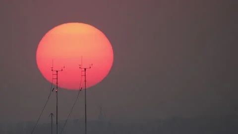 A large orange sun layer settles. Stock Footage 151276565
