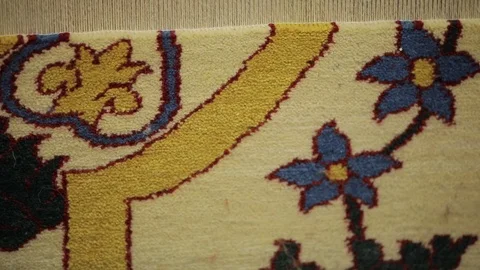 Large oriental carpet with colorful patterns. Handmade carpet production Stock Footage 120609519