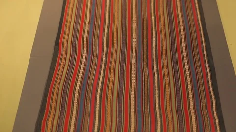Large oriental carpet with colorful patterns. Handmade carpet production Stock Footage 120609606