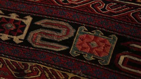 Large oriental carpet with colorful patterns. Handmade carpet production Stock Footage 120609618