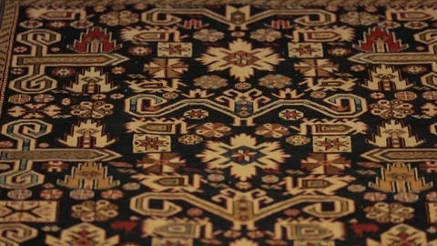 Large oriental carpet with colorful patterns. Handmade carpet production Stock Footage 120609628