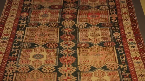 Large oriental carpet with colorful patterns. Handmade carpet production Stock Footage 120609650