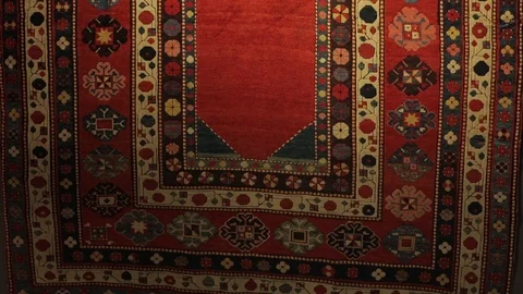 Large oriental carpet with colorful patterns. Handmade carpet production Stock Footage 120609667