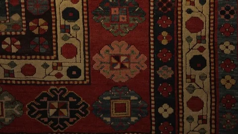 Large oriental carpet with colorful patterns. Handmade carpet production Stock Footage 120609693