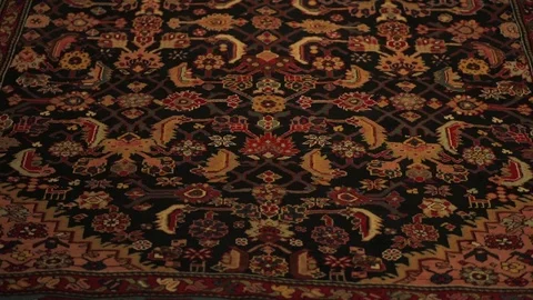 Large oriental carpet with colorful patterns. Handmade carpet production Stock Footage 120609743