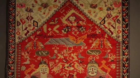 Large oriental carpet with colorful patterns. Handmade carpet production Stock Footage 120609793