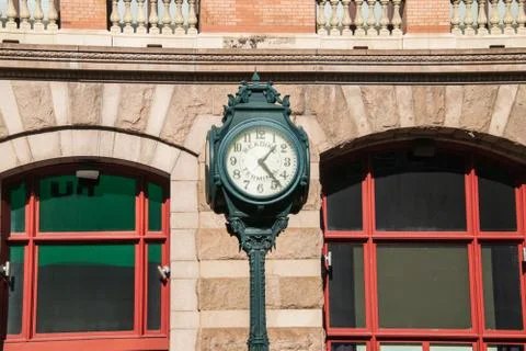 Large ornate clock on a pole in front of the Reading Terminal on Market Stree Stock Photos