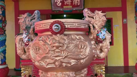 Large ornate incense burner with dragon handles Stock Footage 347015044