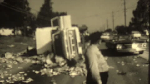 Large overturned vehicle surrounded by debris on road in Nashville, Tennessee Stock Footage 248395713