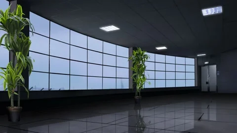 A large passenger airjet taking off, viewed from inside the airport hall Stock Footage