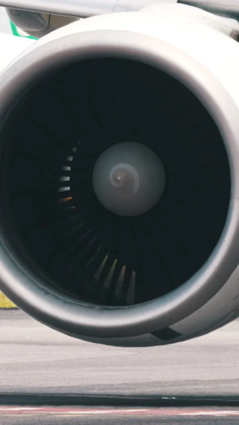 Large passenger airplane engine and landing gear on runway Stock Footage 327638221
