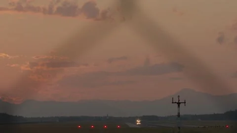 Large passenger airplane taking off against colorful sky Stock Footage 167432194