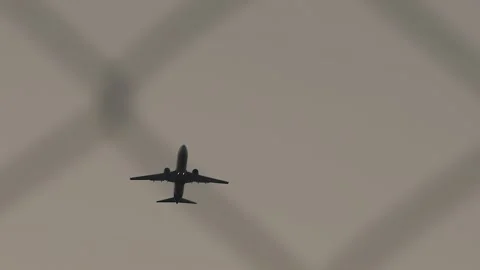 Large passenger airplane taking off against cloudless sky Stock Footage 167432318