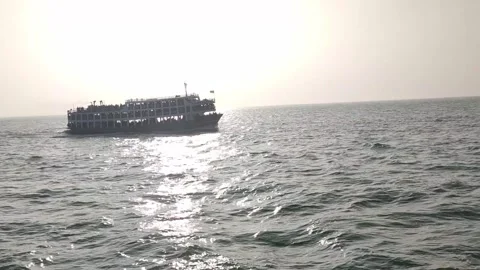 Large passenger ferry boat sailing in the ocean on a sunny day Stock Footage 322096098