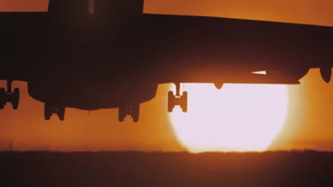 Large passenger jet landing at sunset. 4k footage. Stock Footage 163920122