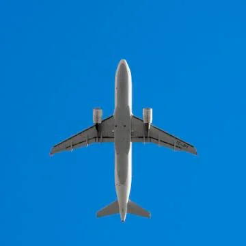 Large passenger plane from bottom Stock Photos