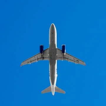 Large passenger plane from bottom Stock Photos