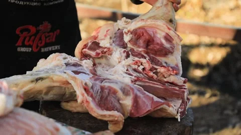 The large piece of beef is cut Stock Footage 243566317