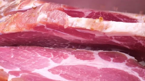 Large piece of meat is cut on the table Stock Footage 218387667