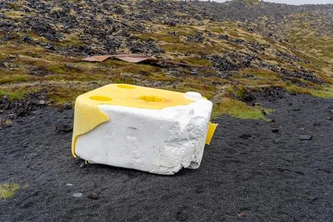 Large piece of polystyrene washed up in Waves Djupalonssandur black sand be.. Stock Photos