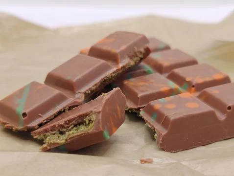 Large pieces of chocolate composition Stock Photos