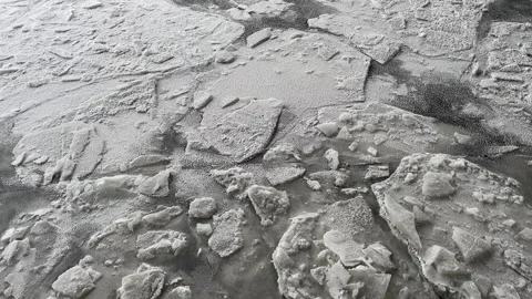 Large pieces of ice on the river Stock Footage 261568742
