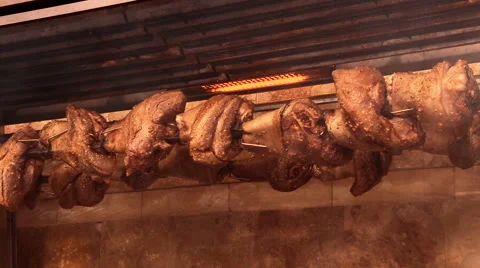 Large pieces of meat on the grill Stockbeeldmateriaal 65386645