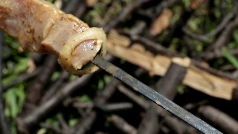 Large pieces of pork meat threaded on a skewer, close-up Stock Footage 92631866
