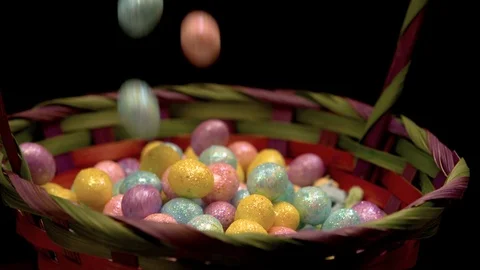Large pile of easter eggs trickle into basket in slow motion Stock-Footage 87690596