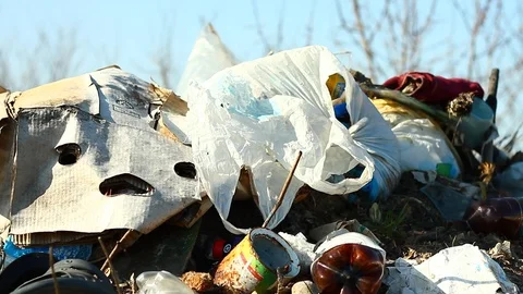 Large pile of garbage in nature Stock Footage 127371720