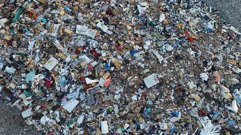 Large Pile of Mixed Waste and Debris in a Polluted Landfill Site Stock Photos
