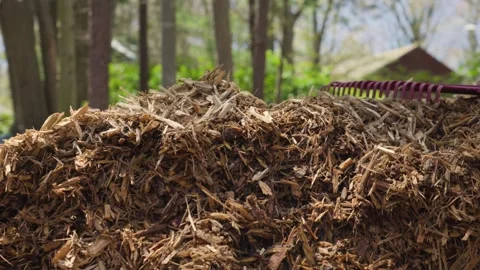 A large Pile of Mulch sitting in the Spring Sun after delivery. Stock Footage 336427480