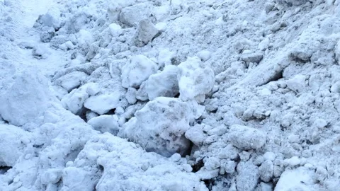Large piles of snow on the side of the road for cars. Stock Footage 287005750