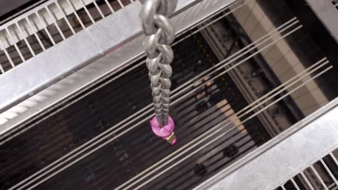 Large Pink Hook On A Chain Is Lowered Through The Raised Floor Stage Stock Footage 262112077