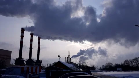 Large pipe thick smoke is poured from the factory pipe in contrast to the sun. Stock Footage 150904620