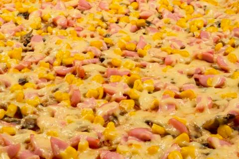 Large pizza close-up side view Stock Photos