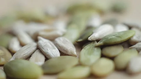 Large plans of raw  pumpkin and sunflower  seeds.  Macro shot. Healthy eating Stock Footage 50307457