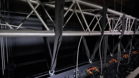 A large plasma screen rises up into the cinema. Stock Footage 146349273