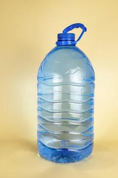 A large plastic bottle of drinking water of 5 liters. A bottle of water. The Stock Photos
